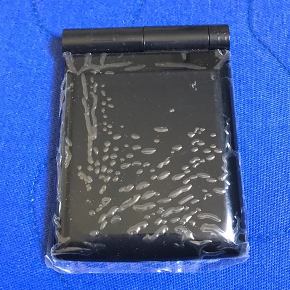 Lighted compact folding mirror