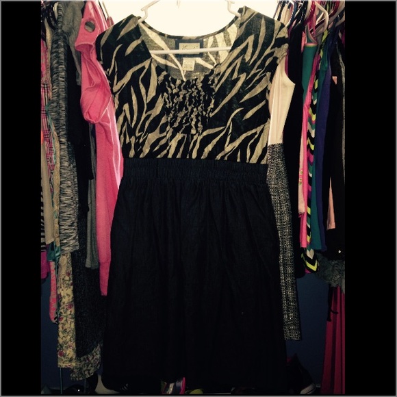 😍Bring in Fall with a classic Zebra Asym Dress!!