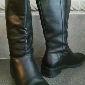 Top of the boot is 9" above my ankle bone.