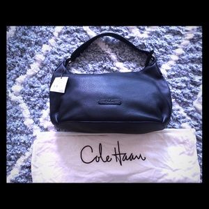 Black pebbled leather hobo bag