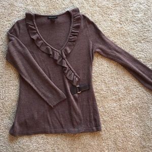 Faux wrap sweater with ruffle detail