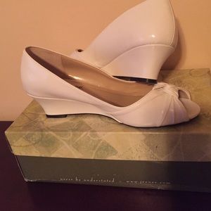 Peep toe white wedges!