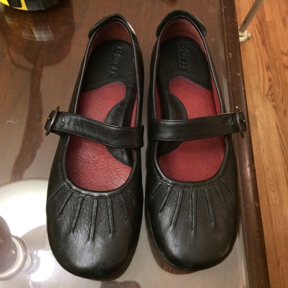 Black born leather flats