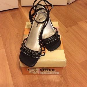 Black strappy heeled sandals