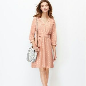 Peachy pink dress with small white flowers