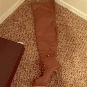 Lace up thigh high boots