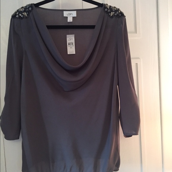 Dress blouse with  shoulder embellishments