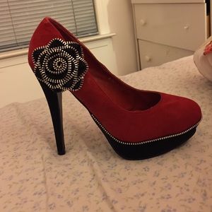 Red high heels with zipper flower on the side
