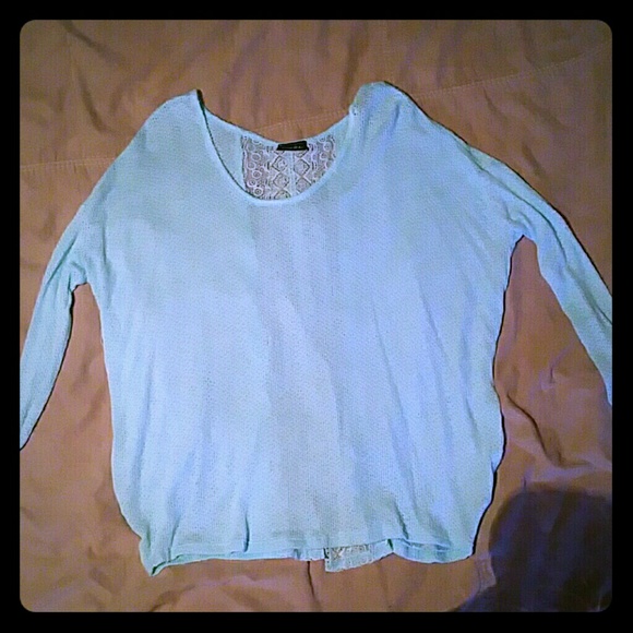 Blue open back shirt