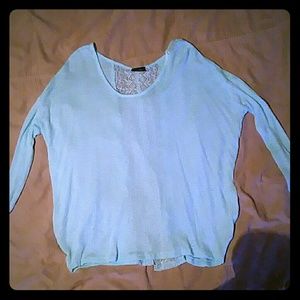 Blue open back shirt