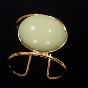 3/20 Gold bangle with light green stone
