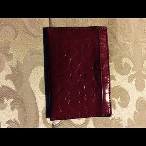 Patent leather monogrammed Coach wallet pouch