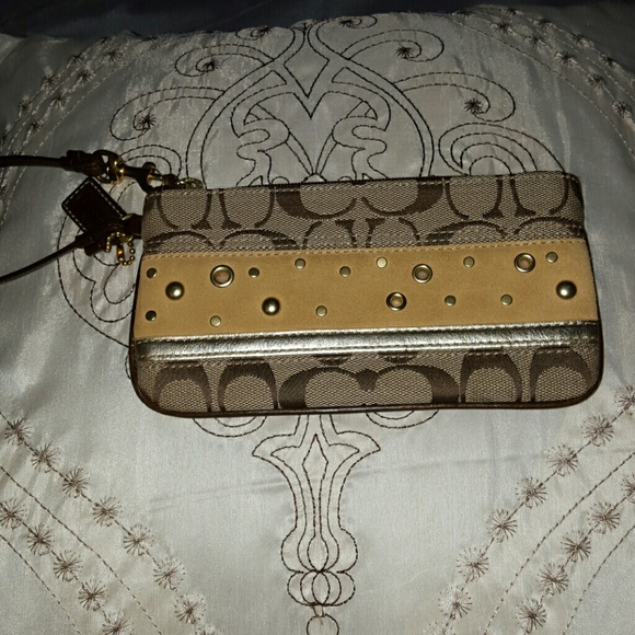 Casual Coach wristlet with suede detail