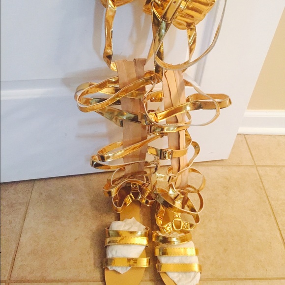 Gold thigh high sandal. Brand New