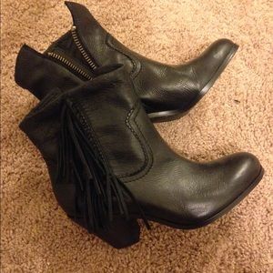 Black Sam Edelmon zip up leather booties.