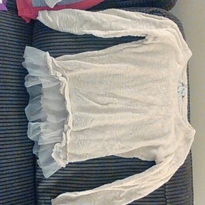 Fancy sweater type shirt.