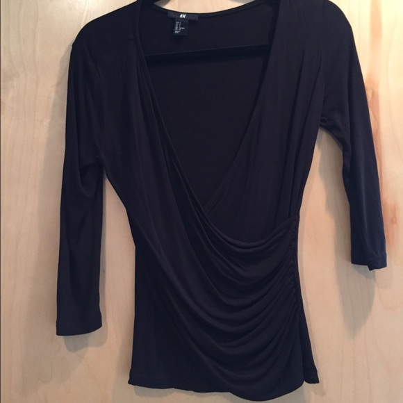Black quarter length top, never been worn