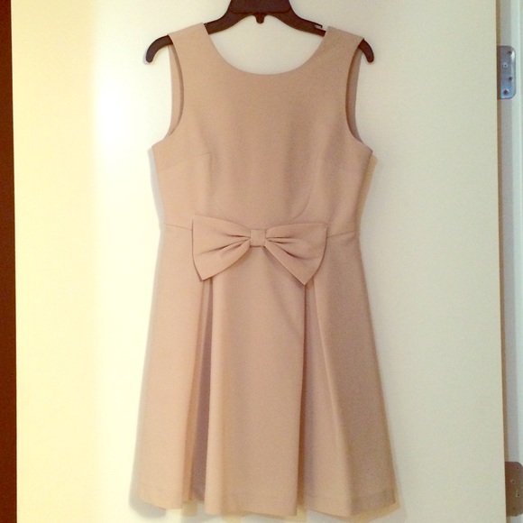 Beautiful cream bow dress