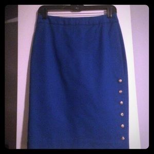 Bright blue pencil skirt with gold accent buttons