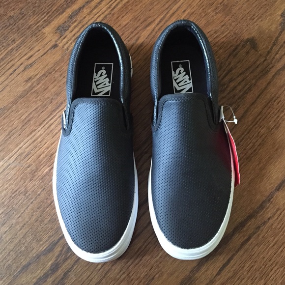 Never worn black leather vans