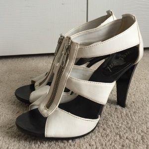 Black and white zip up cage heel