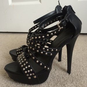 Edgy strappy spiked studded high heel