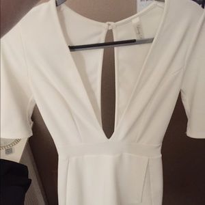 White romper with low cut in front and back