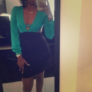 Black and turquoise long sleeve cut out dress