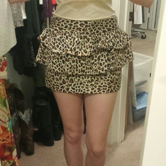 Dresses & Skirts - DONATED-NWT Leopard Peplum Mini Skirt