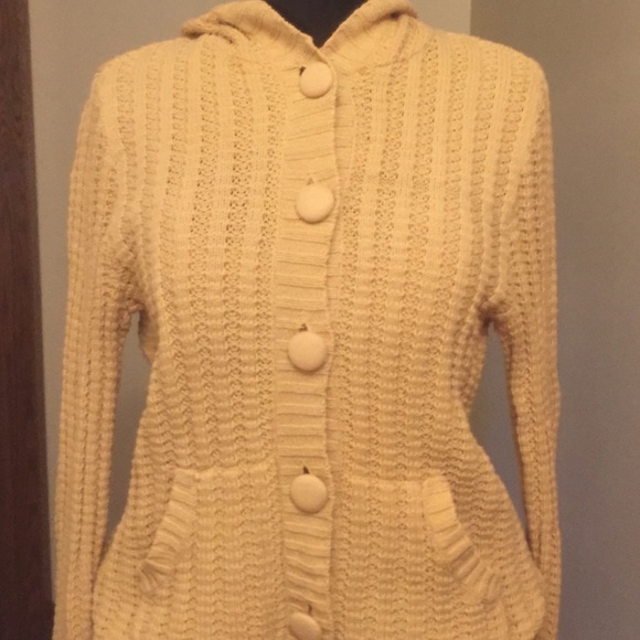 This sweater is a lovely shade of YELLOW