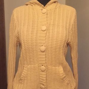 This sweater is a lovely shade of YELLOW