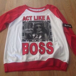 Red and white Long sleeve shirt .