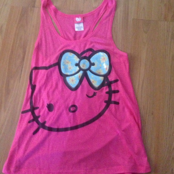 Pink and black tank top . Can also fit a large
