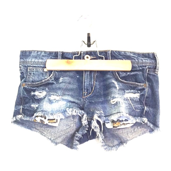 Denim cheetah cut off shorts.