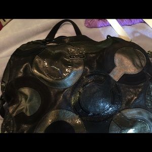 Coach Madison or Maggie