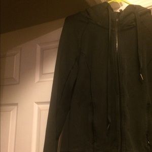 Black Lululemon zip up hoodie.