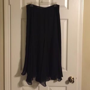 Black dress skirt. 28" in length.