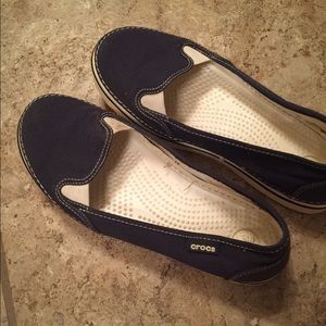 Crocs slip on shoes.  Navy.