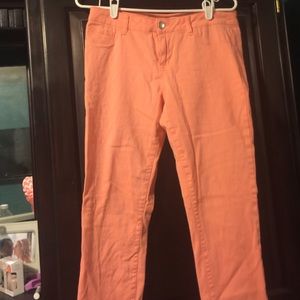 Peach / coral skinny jeans