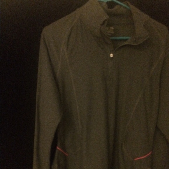 Semi fitted polyester and spandex sports jacket.