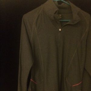 Semi fitted polyester and spandex sports jacket.
