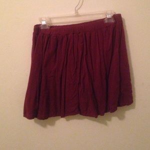 A burgundy brandy Melville skirt