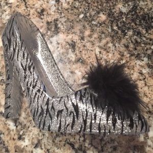 Cell phone holder in zebra plastic with feathers!