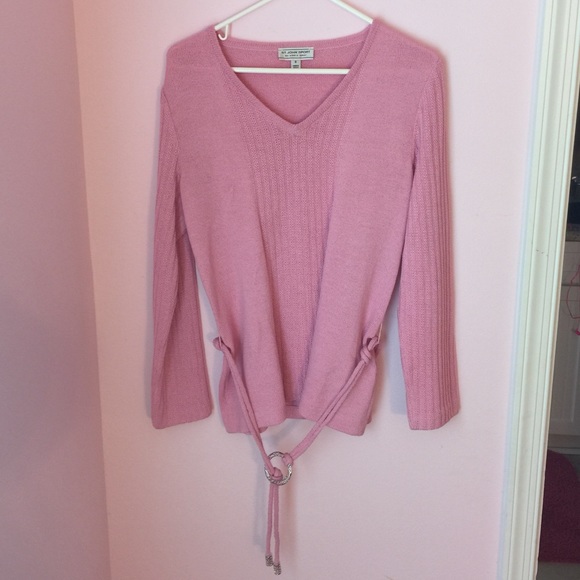 Light pink sweater top.