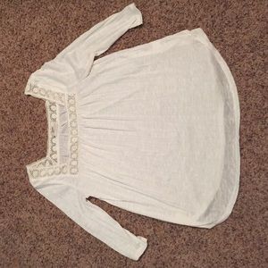 Half sleeved white flower neck line shirt