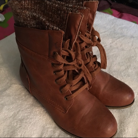 Brown combat boots.