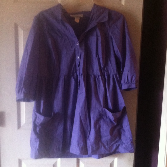 Purple shirt or dress.