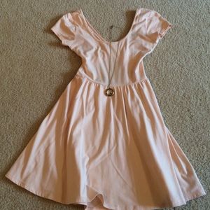 Light pink skater dress with open criss cross back