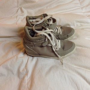 Studded sneakers with heel