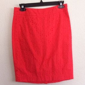 Coral knee length skirt.